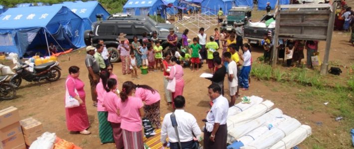 Supporting aids to flood victims in refugee camps