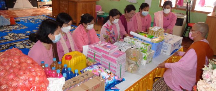 Donation at the Pyin Gyi Tharthana Waypula Nunnery